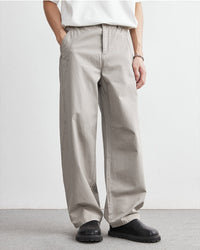 Avslappnade byxor med elastiskt midjeband och jeansliknande look
